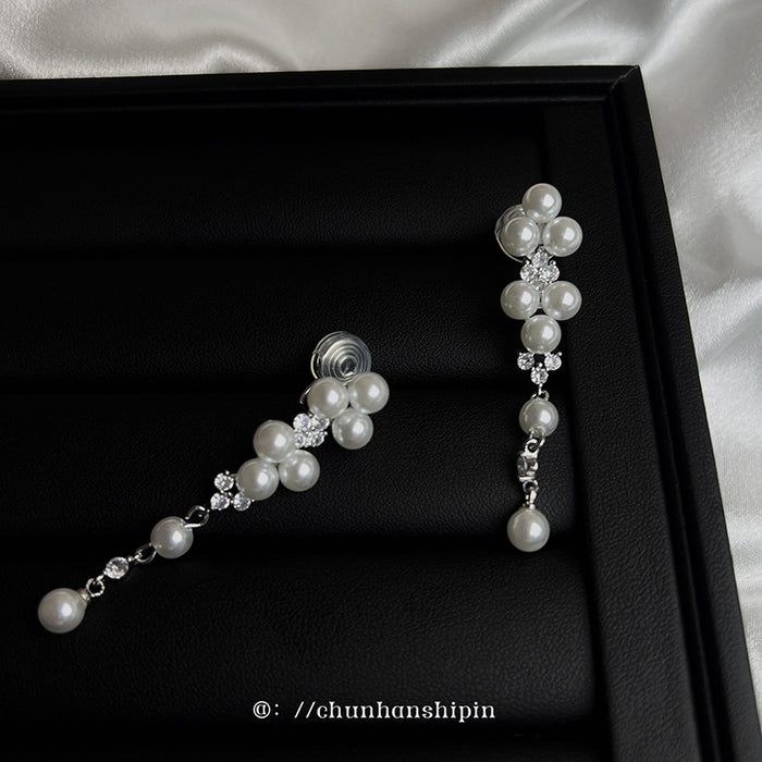 Wholesale Elegant long pearl ear clip without ear hole tassel earrings, fashionable and light luxury