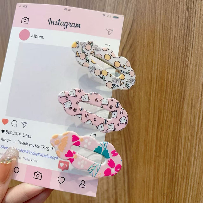 Wholesale Cute kids'  hair clips with various flower patterns