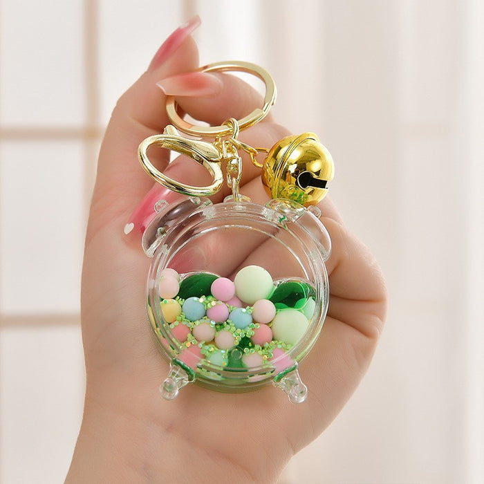 Wholesale Acrylic oil bottle candy Bean astronaut keychain