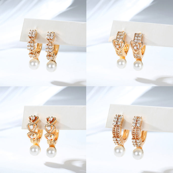 Wholesale Copper gold-plated retro light luxury simple pearl earrings, small and fashionable design, inlaid with zircon ear buckles, wholesale of ear accessories