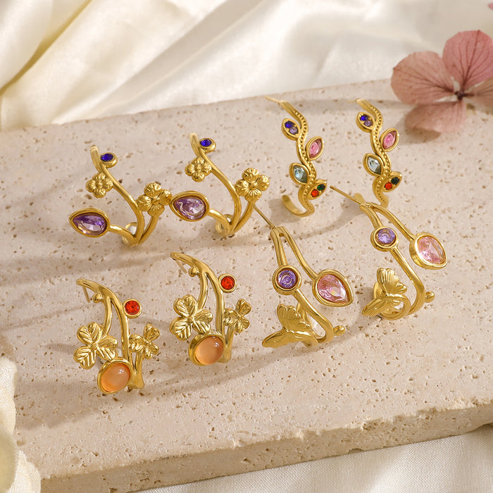 Wholesale Gold titanium steel earrings inlaid with colorful horse eye zircon stainless steel earrings, female hollow leaf C-shaped earrings