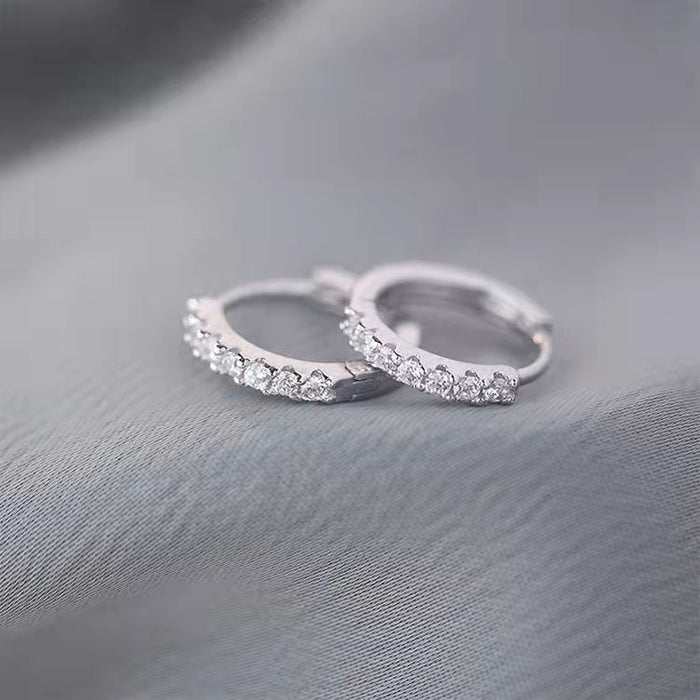 Wholesale Versatile silver plated sparkling diamond earrings with simple circular ear loops, exuding a sweet and feminine charm