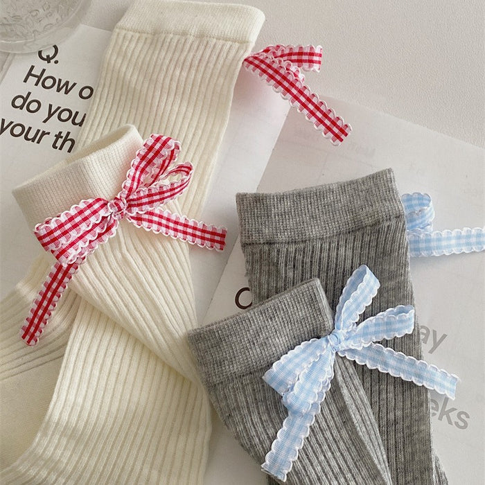 Wholesale Checkered bow, stacked socks, mid tube socks