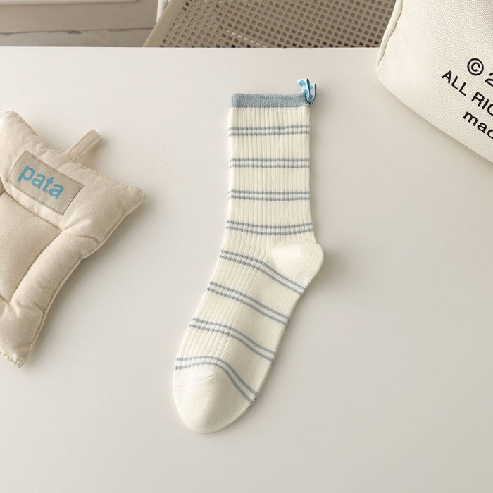 Wholesale Striped mid tube socks with heart-shaped fabric label, double needle long tube stacked socks