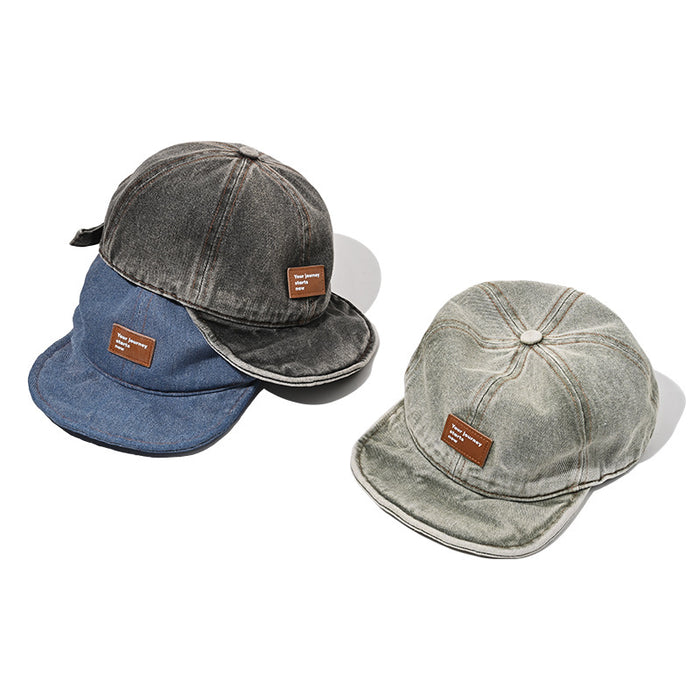 Wholesale Retro soft top baseball cap washed with water, short brimmed duckbill cap made of old leather label hat