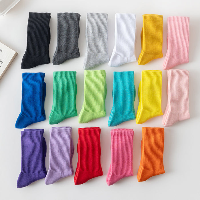 Wholesale Solid color high elastic looped socks for men and women, long socks for sports, cotton socks