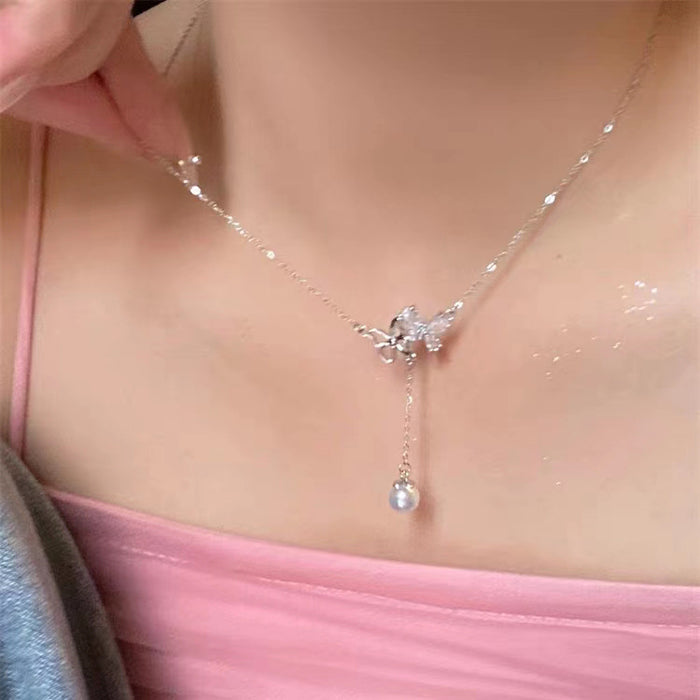 Wholesale Titanium steel micro inlaid jewelry hollow butterfly collarbone chain pearl tassel pendant light luxury accessory