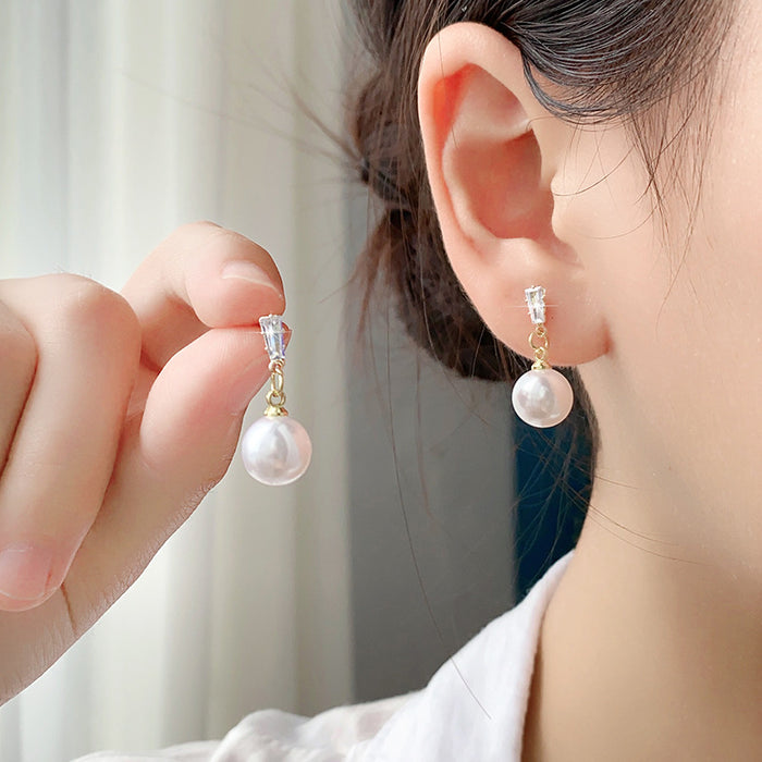 Wholesale Retro pearl earrings with simple and fashionable temperament, personalized and high-end feeling, diamond studded earrings