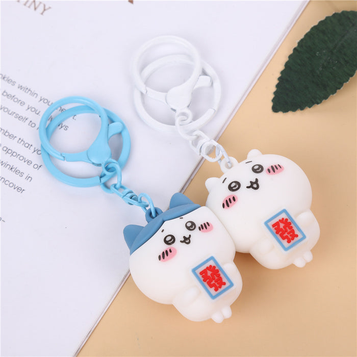 Wholesale Creative cartoon couple key chain shaking sound with small eight couples friends magnetic key chain bag