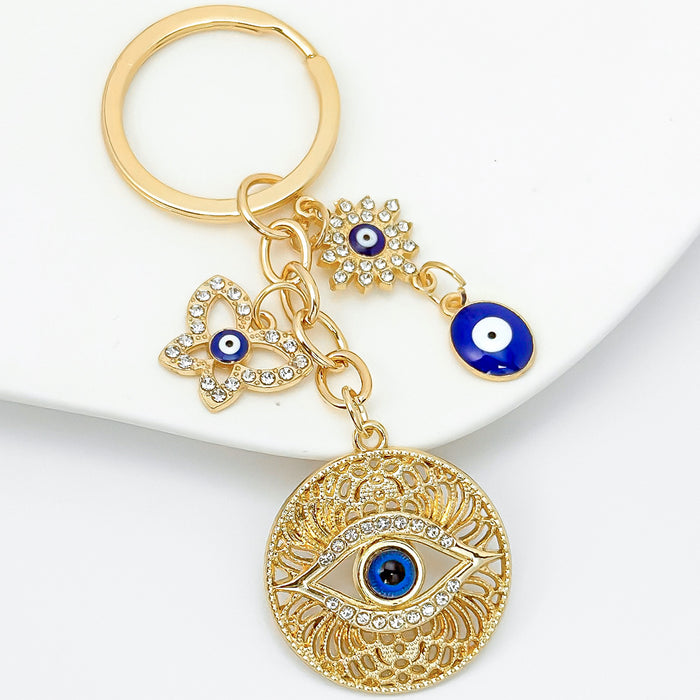 Wholesale Diamond-encrusted blue eyes evil eye tassel keychain