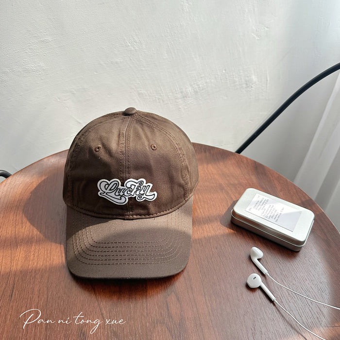 Wholesale Vintage washed embroidered letter baseball cap with wide brim, soft top, duckbill cap, versatile hat