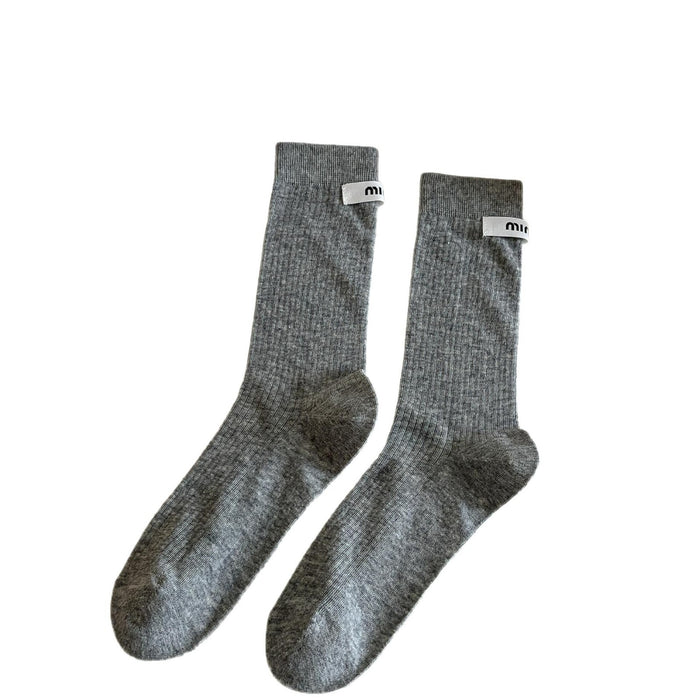 Wholesale Medium length socks with solid color letters, fabric labels, stacked socks, thin cotton socks, sweat absorbing and breathable