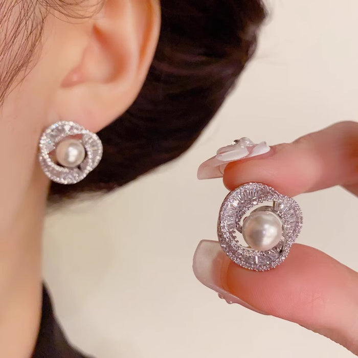 Wholesale Exquisite, fashionable, light luxury, super sparkling full diamond pearl spiral earrings, silver needle temperament, versatile and high-end earrings