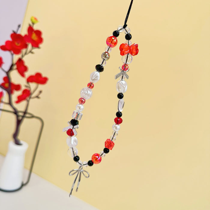 Wholesale red and white alloy ribbon bow mobile phone pendant lanyard mobile phone chain decoration