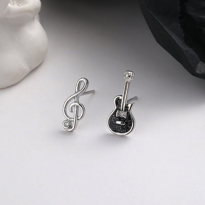 Wholesale Creative Cute Note Earrings Black Compact Single Diamond Asymmetric Violin Instrument Earrings