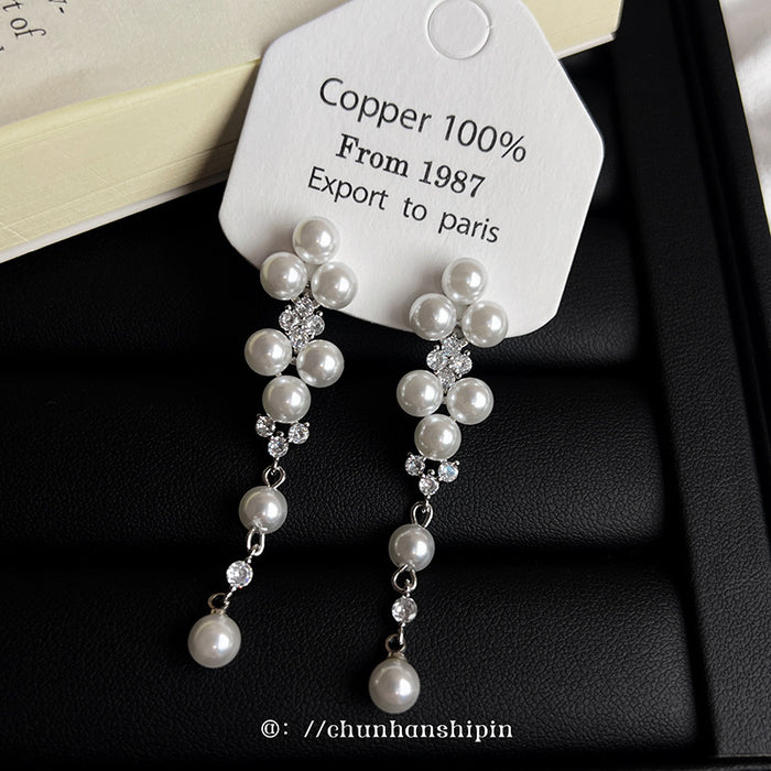 Wholesale Elegant long pearl ear clip without ear hole tassel earrings, fashionable and light luxury