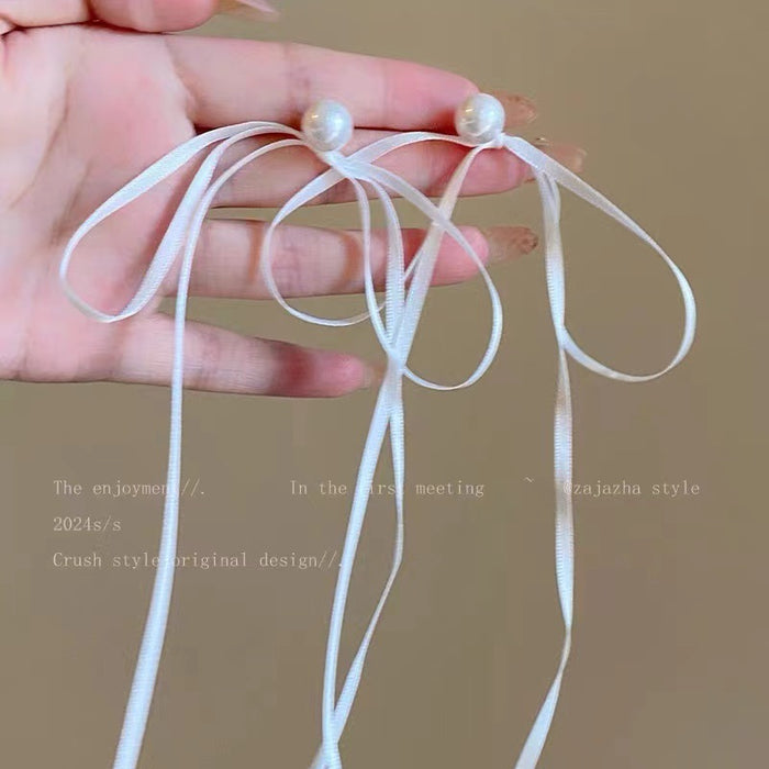 Wholesale Pearl ribbon earrings, bow earrings, niche, unique and sweet earrings