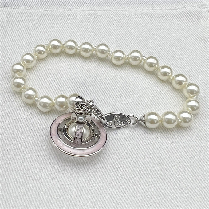 Wholesale Pearl Enamel 3D Saturn Pendant Long Necklace