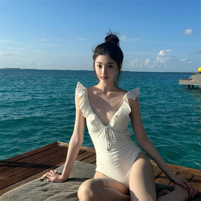 Wholesale Jumpsuit triangle swimsuit with floral shoulder straps, sexy