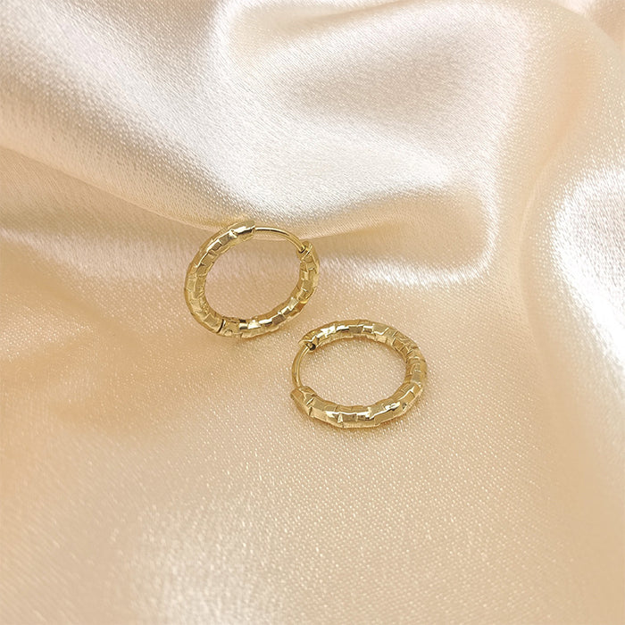 Wholesale Titanium steel earrings, gold-plated earrings, trendy and fashionable earrings, embossed circle earrings