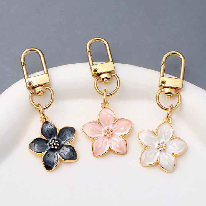 Wholesale Simple Dropping Oil Cherry Blossom Pendant Keychain Alloy Daisy Flower