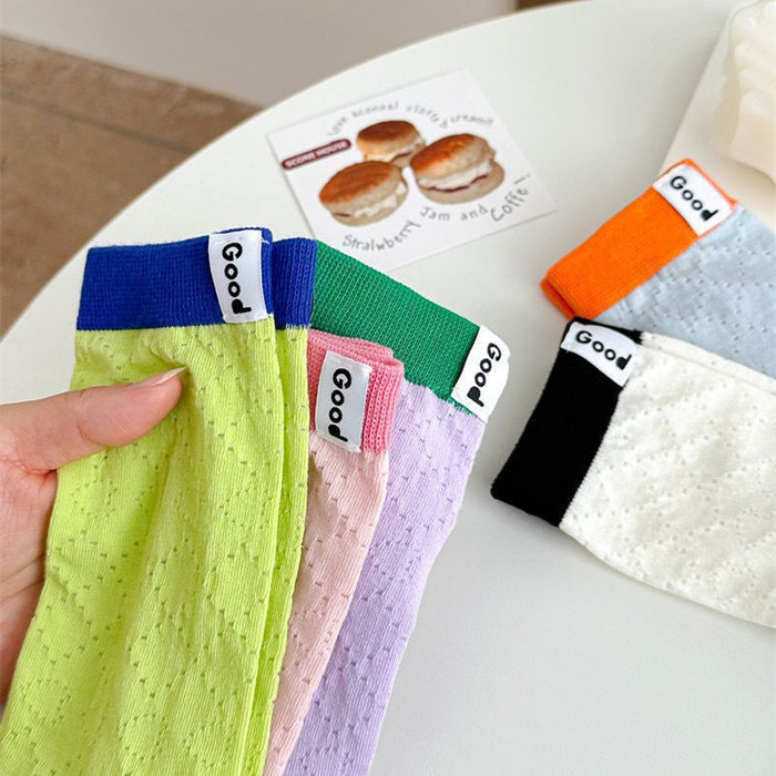 Wholesale Color blocked socks with hollowed out mesh and breathable lettering fabric label, colored midsole socks