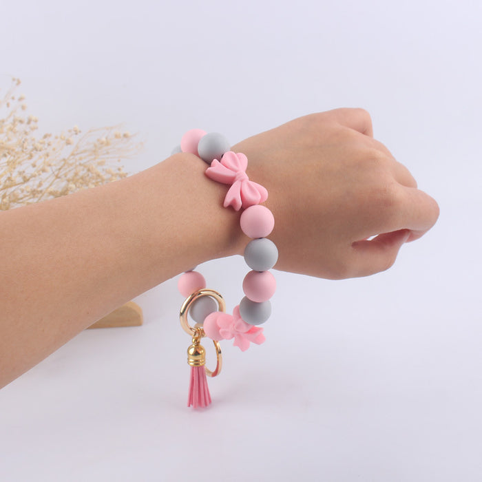 Wholesale Cartoon bow silicone bracelet keychain handmade beaded bracelet jewelry