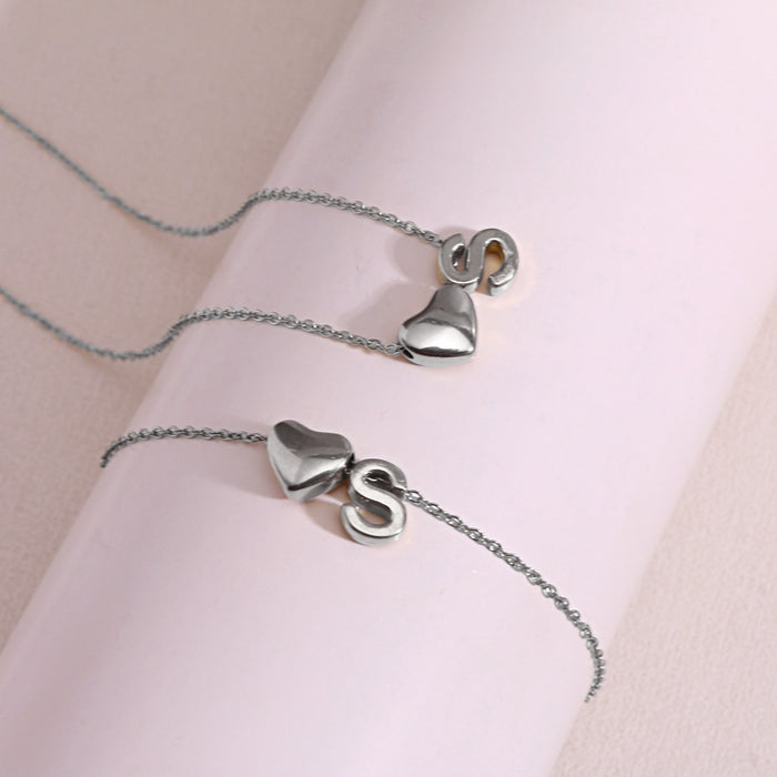 Wholesale Clavicle chain jewelry accessory 26 letter heart pendant titanium steel necklace