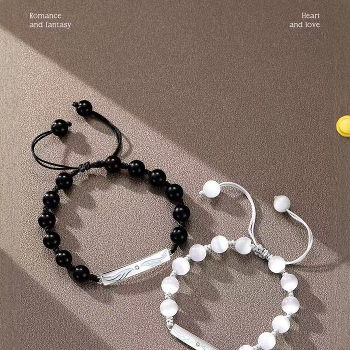 Wholesale Angel Wings Fluorescent Couple's Hand Rope Original Design High End New Handpiece