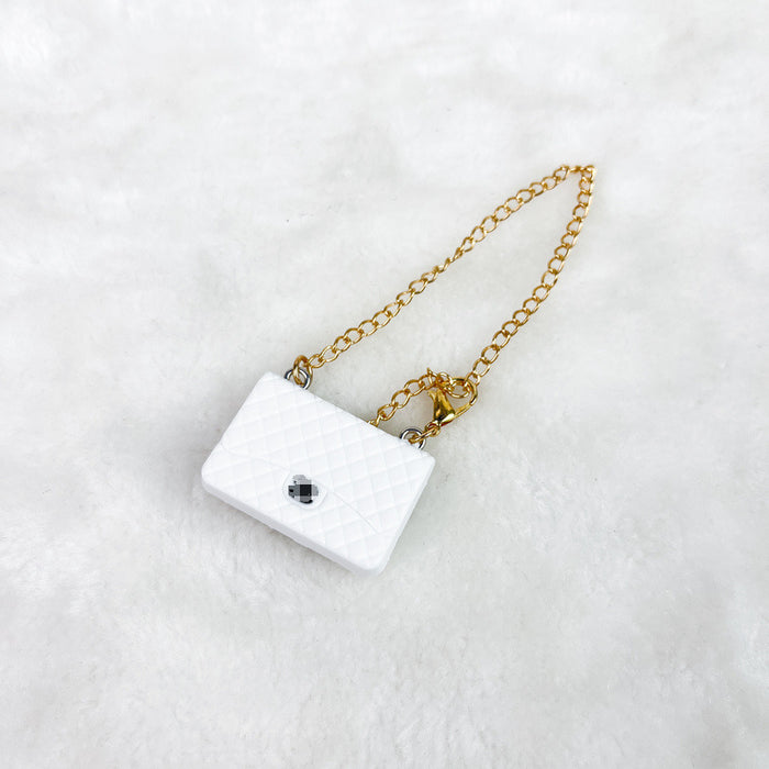 Wholesale Doll accessories,  bag accessories,  Vinyl glue doll clothing pendants