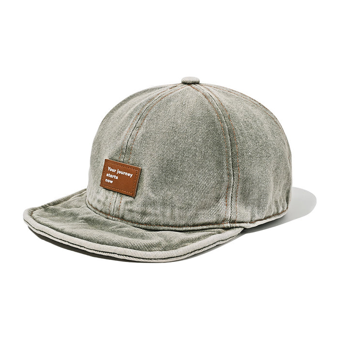 Wholesale Retro soft top baseball cap washed with water, short brimmed duckbill cap made of old leather label hat