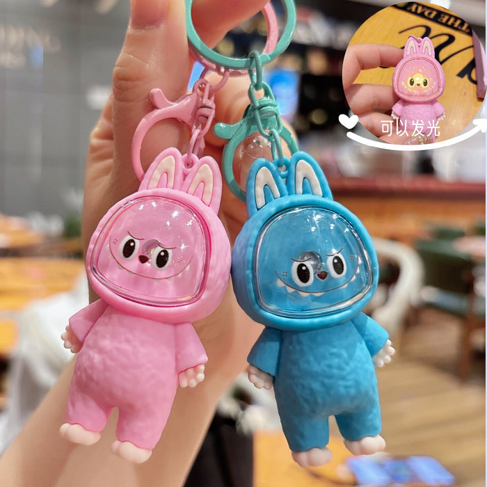 Wholesale Creative cartoon illuminated keychain figurine, car couple bag pendant, student backpack ornament