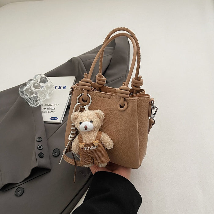 Wholesale Niche design, cute handheld commuting shoulder bag, fashionable and simple crossbody bag