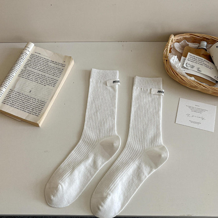Wholesale Medium length socks with solid color letters, fabric labels, stacked socks, thin cotton socks, sweat absorbing and breathable