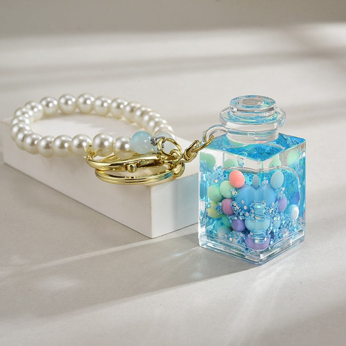 Wholesale Acrylic Bead-Filled Oil Bottle Pendant Keychain