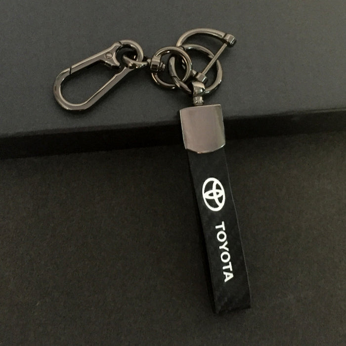 Wholesale Car keychain carbon fiber leather strap car keychain hanging rope