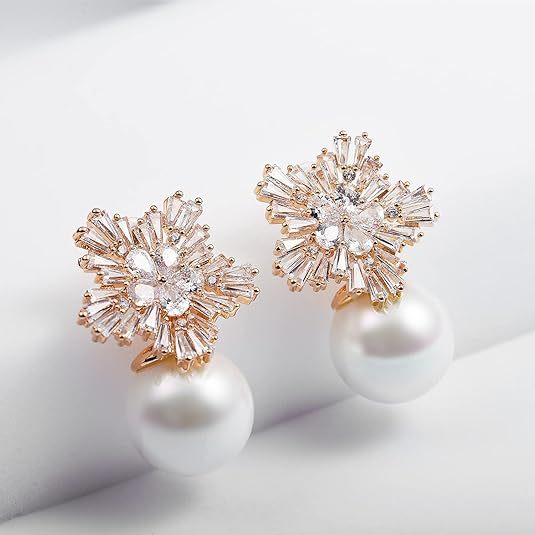 Wholesale Fashionable temperament, design sense, snowflake pearl earrings, pure silver needles, trendy earrings, earrings