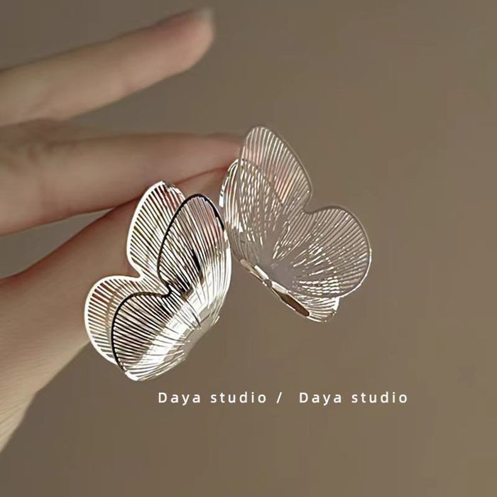 Wholesale Sparkling diamond dynamic hollow butterfly tassel earrings, light luxury temperament, high-end feeling, niche earrings, exaggerated earrings