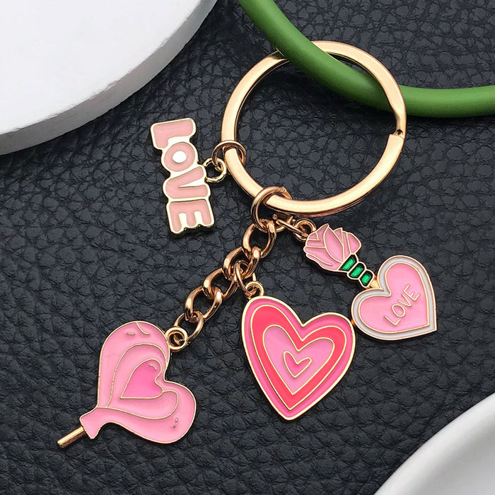 Wholesale Cute pink heart-shaped rose potion metal  keychain