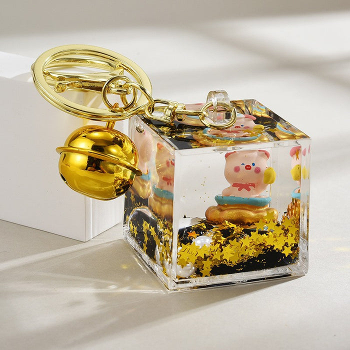 Wholesale Oil-Filled Black Gold Quicksand Piggy Liquid Keychain