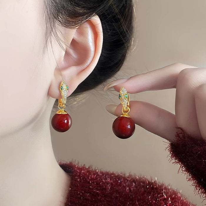 Wholesale Full diamond earrings with a niche design, snake shaped pearl earrings, unique earrings, and ear buckles