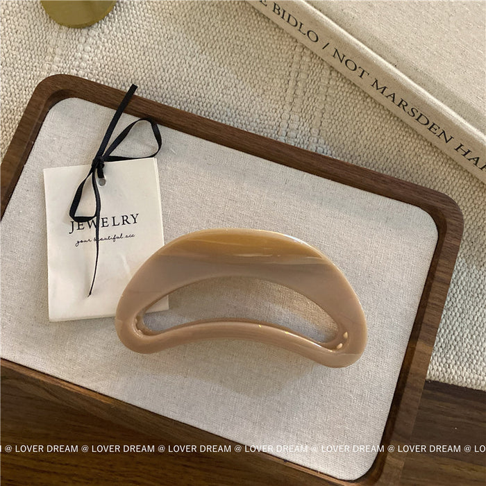 Wholesale Pink semi-circular hair clip with shark clip at the back of the head, versatile hair accessory