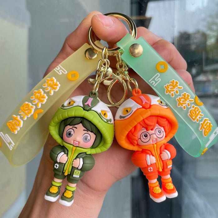 Wholesale Couple keychain, handbag pendant, car keychain, doll machine, small gift