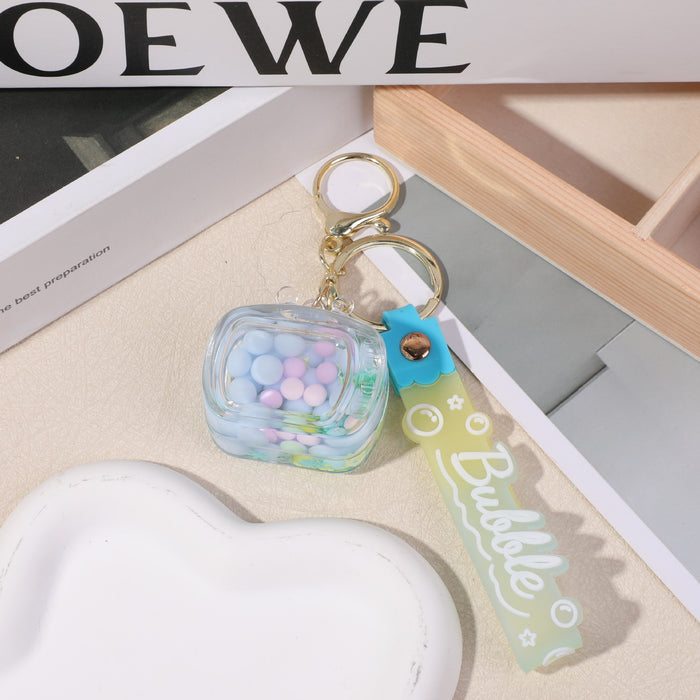 Wholesale Creative personality small square oil quicksand key chain acrylic student backpack mobile phone pendant pendant small gift