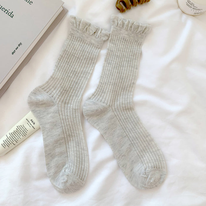 Wholesale Socks with thin midsole, vertical stripes, mesh, breathable bubbles, ribbed mouth, fashionable stacking socks