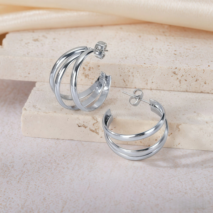 Wholesale Geometric Titanium Steel Three-Line Dense Earrings