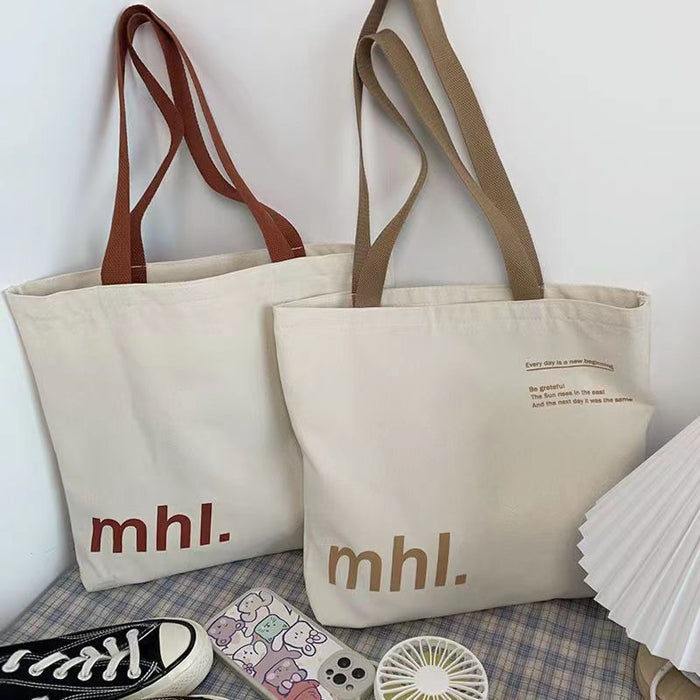 Wholesale New canvas bag, niche letter printed shoulder bag, large capacity commuting tote bag