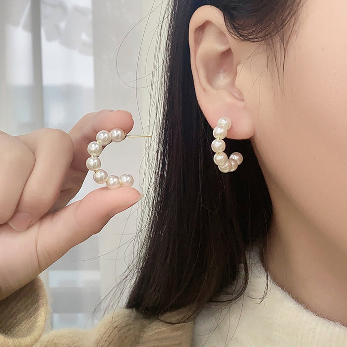 Wholesale Circle pearl earrings with a high-end feel, new round earrings, and earrings