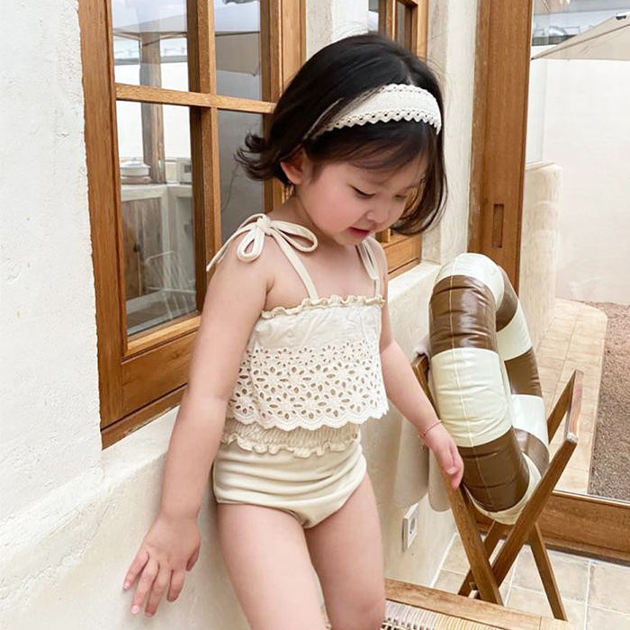 Wholesale Girls' one-piece swimsuit with hollow lace straps, baby suspender swimsuit