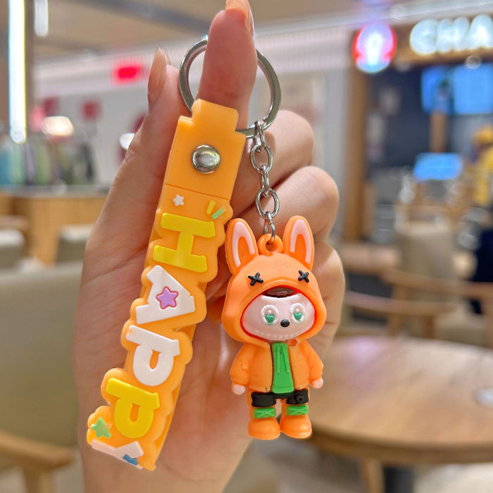 Wholesale Cute cartoon silicone keychain with cute little monster keychain for sweatshirt